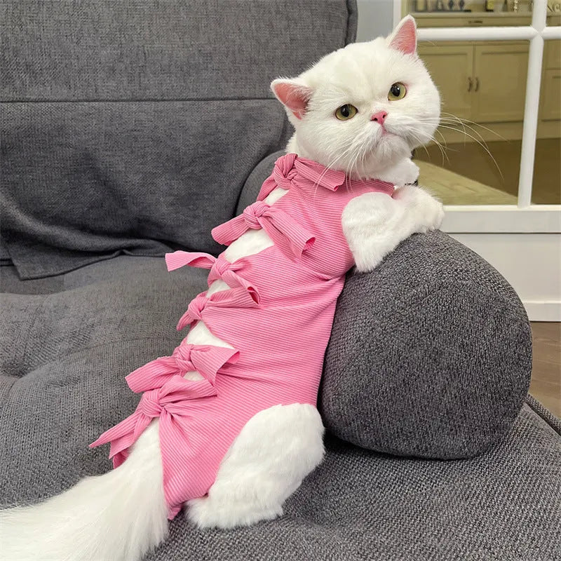 Adjustable lace-up cat sterilisation recovery suit in polyester, shown in various colours.