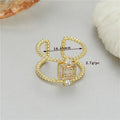 Adjustable asymmetric open ring in 14K gold-plated copper, colour H12813.