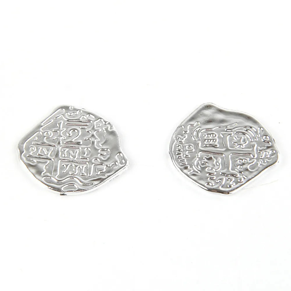 Plastic Roman pirate coins in gold, silver, and bronze electroplated finishes