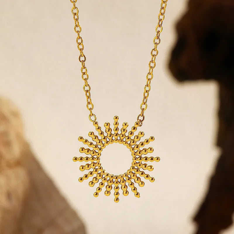 Sunflower Series 14K gold-plated jewellery set showing matching necklace and bracelet with geometric design