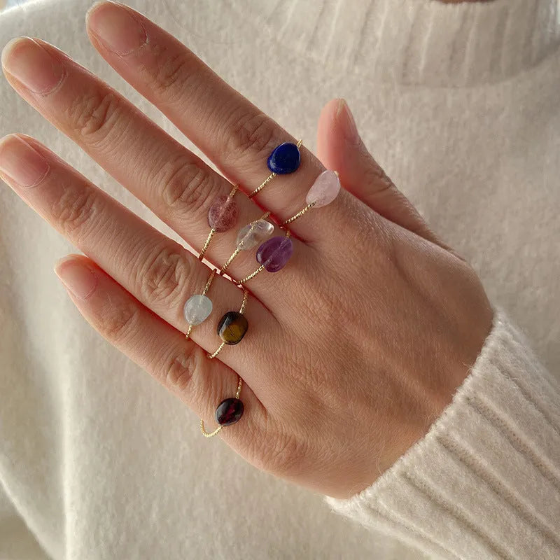 Geometric women's ring with a coloured agate stone in an original design.