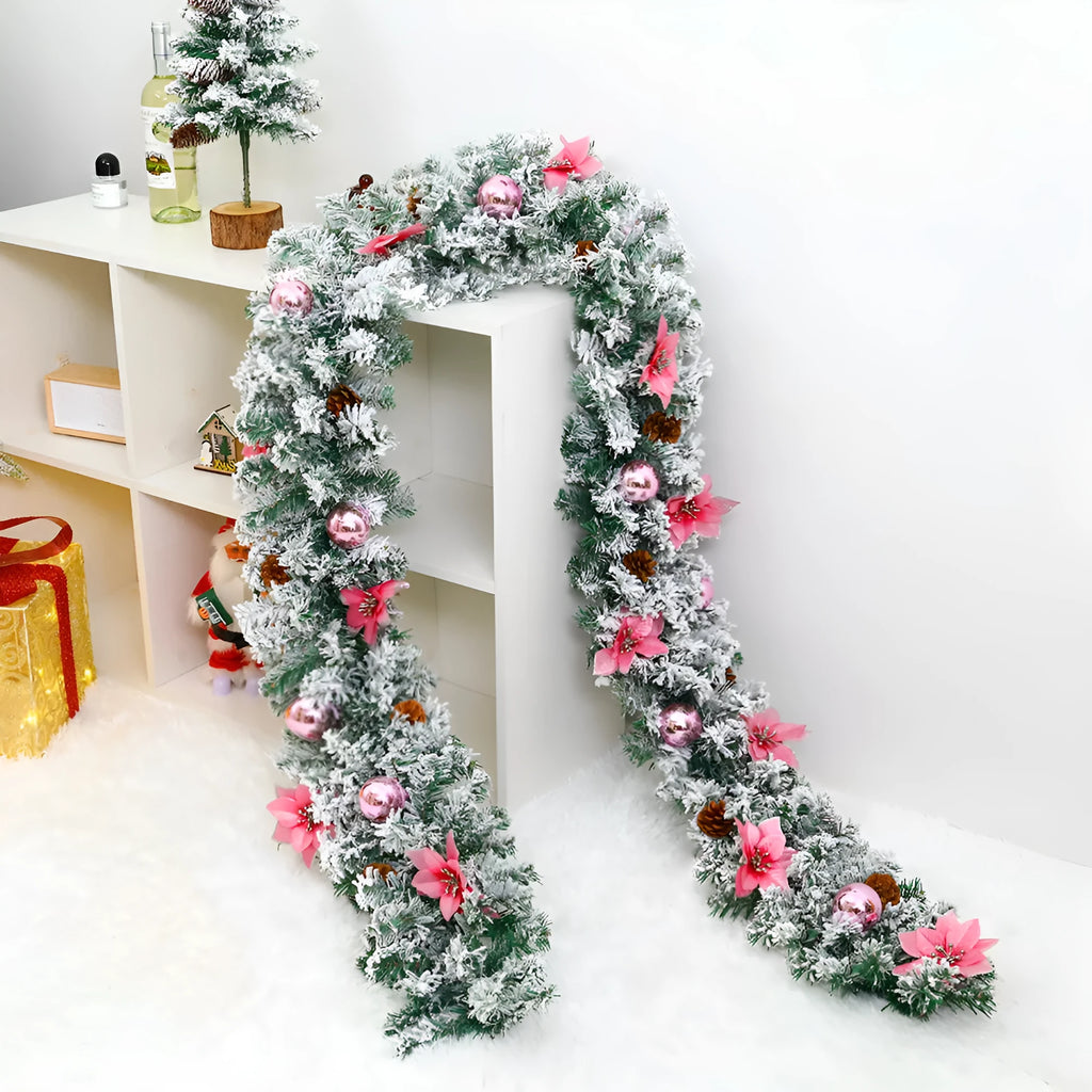 PVC Christmas rattan garland with flocked decoration in golden colour, draped to show texture and length.