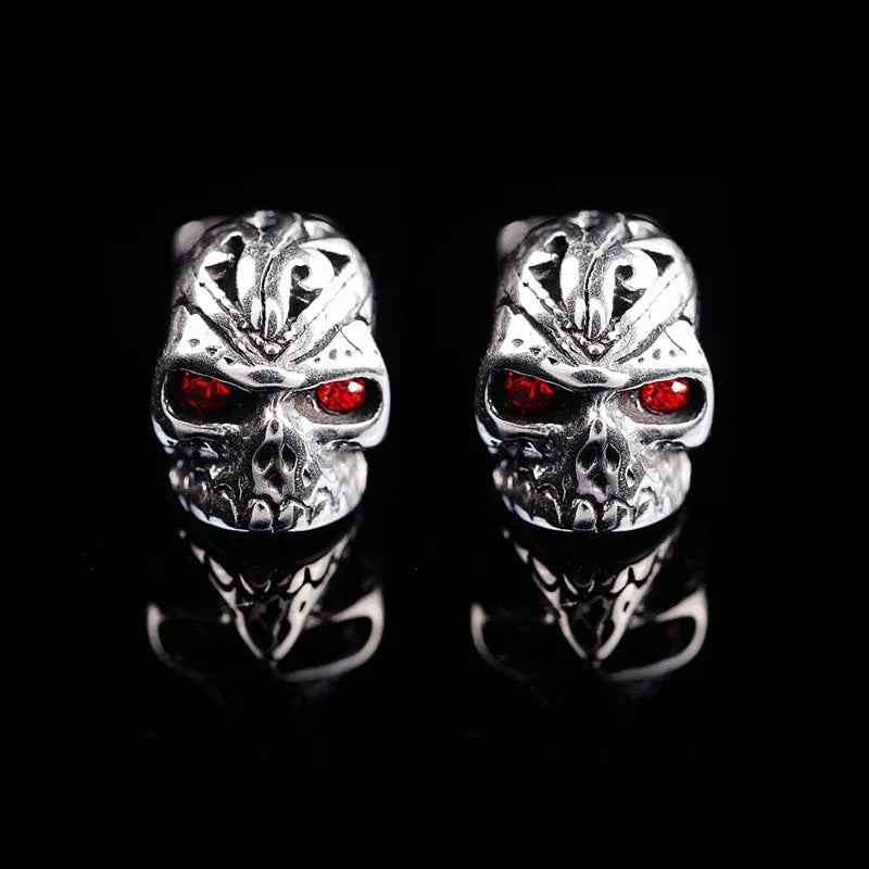 Retro skull stud earrings with red eye detailing and electroplated alloy construction