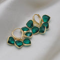 Green heart-shaped ear clip earrings with dancing shade design and artificial gemstones