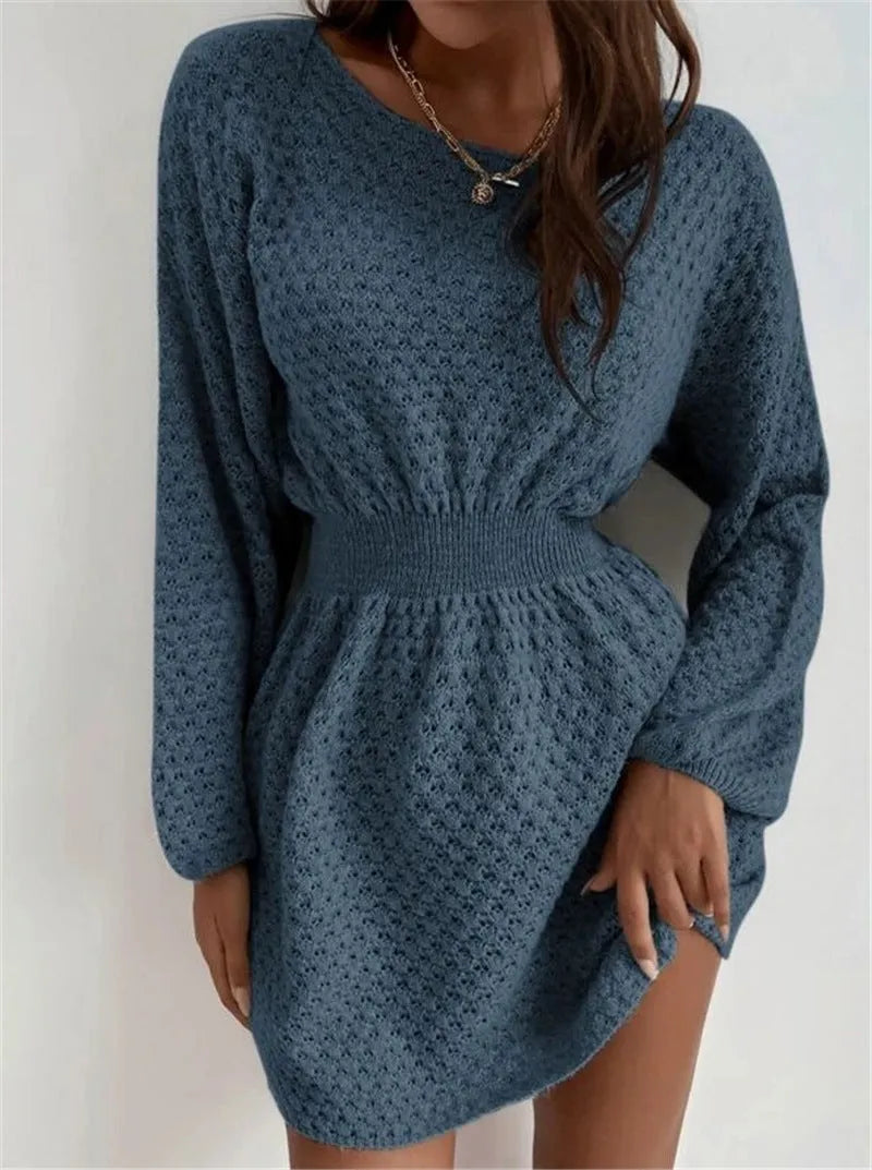 Blue women's knitted dress with fitted waist, French loose neck, and hand-crocheted flower decorations