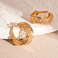 Geometric women's hollow stud earrings with twisted round design in gold or silver finish