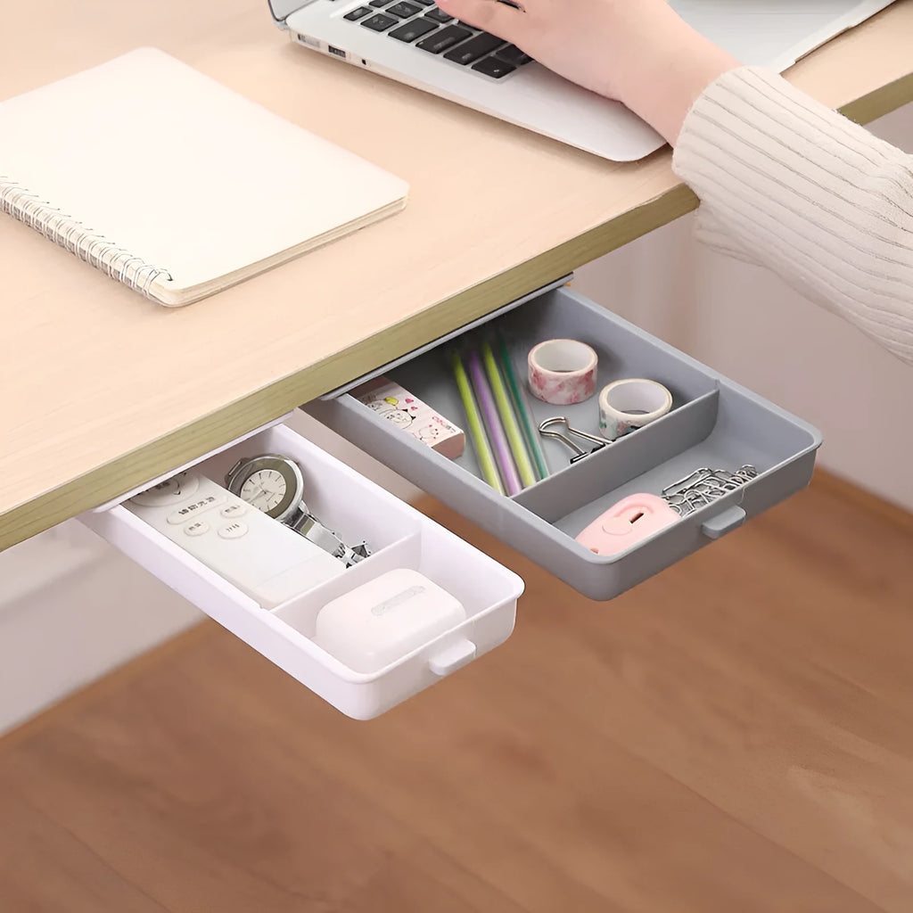 Plastic storage box with adhesive base for mounting under a table