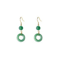 Green geometric peace buckle shape earrings with jade design on zinc alloy background