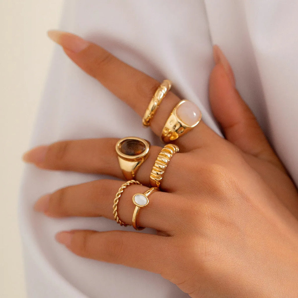 Light gold geometric irregular ring set with six different alloy rings