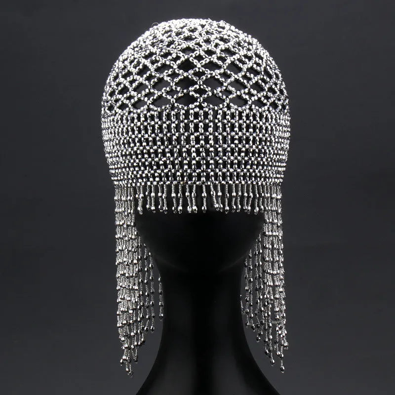 Handmade beaded belly dance hat with alloy construction and long tassels in black or silver