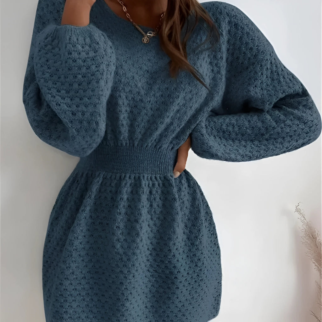 Blue women's knitted dress with fitted waist, French loose neck, and hand-crocheted flower decorations