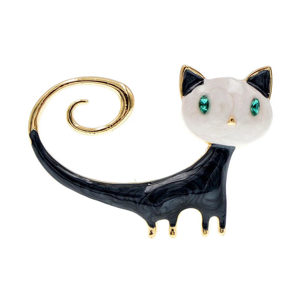 White and orange alloy cat brooch with a painted tailing up kitty design.