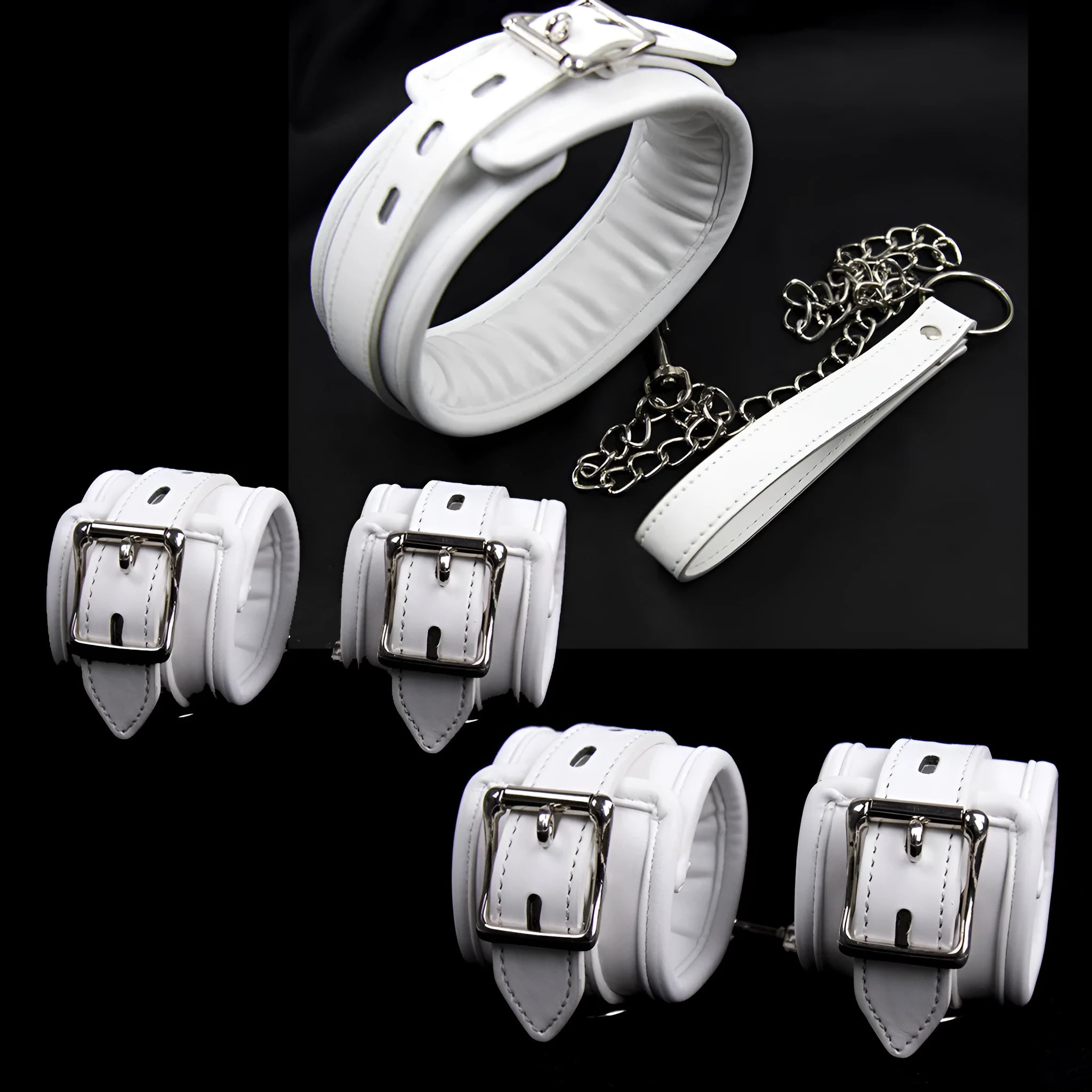 White PU sponge bondage restraint set showing handcuffs, footcuffs and neck scarf