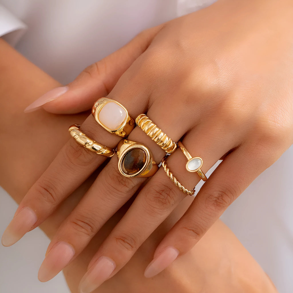 Light gold geometric irregular ring set with six different alloy rings
