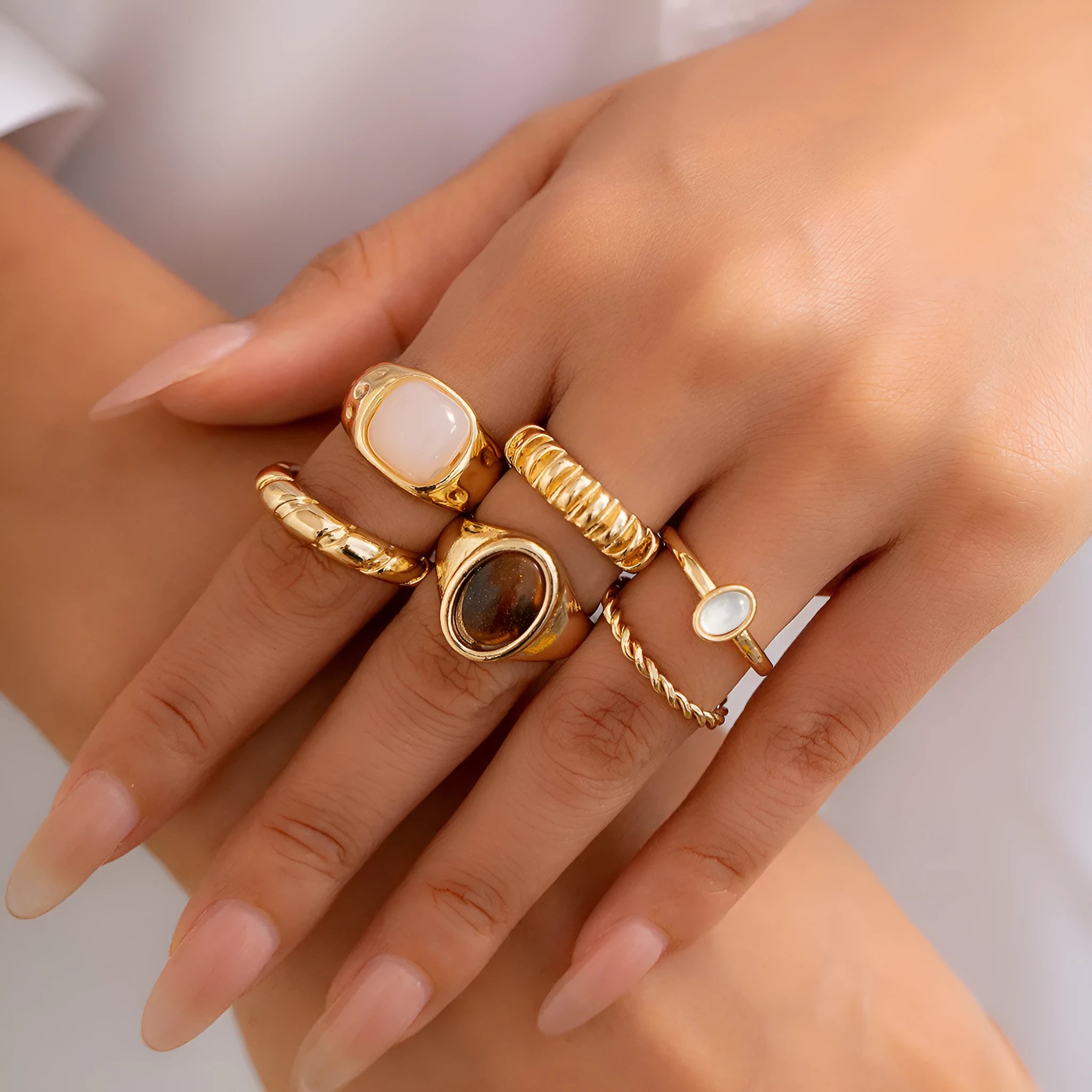 Light gold geometric irregular ring set with six different alloy rings
