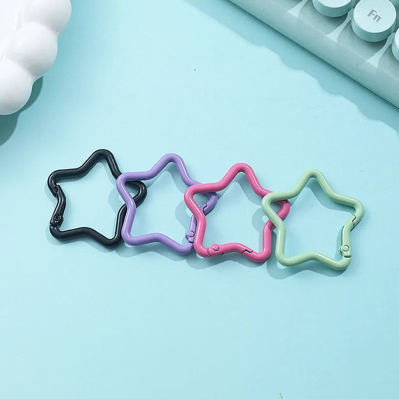 Zinc alloy five-pointed star keychain in a choice of macaron colours for bag decoration.