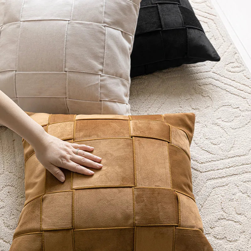 Square chenille woven cushion in beige colour on a grey sofa, 50x50cm size.