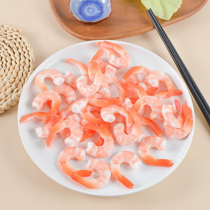 Detailed PVC simulation shrimp keychain bag charm on a white background.