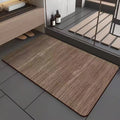Square American-style diatom ooze floor mat with a geometric wood grain pattern in a bathroom setting.