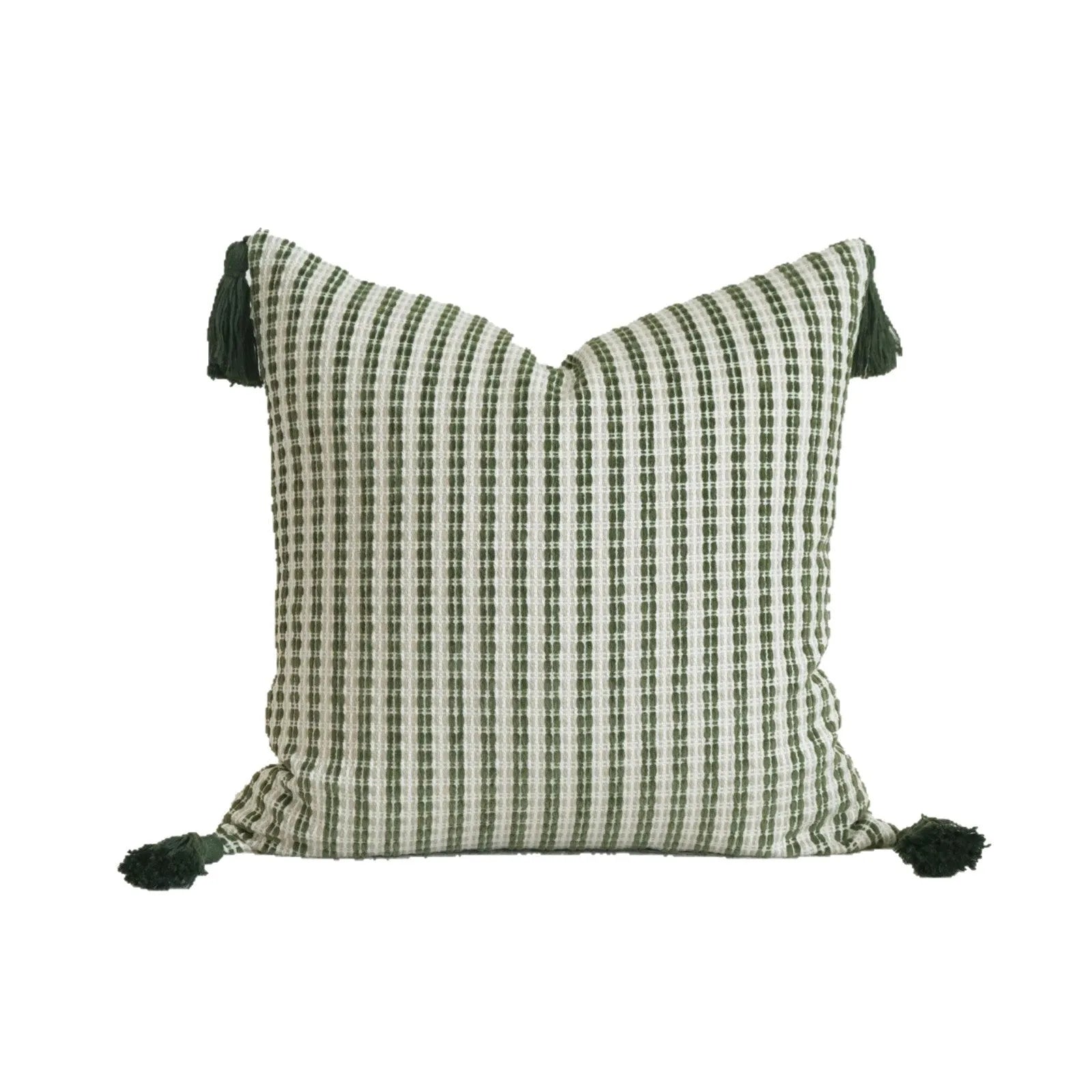 Green cotton and linen tassel hotel sample pillow with botanical patterns on a brushed fabric case
