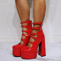 Black patent leather women's platform high heels with a thick 8cm heel and a serpentine ankle buckle strap.