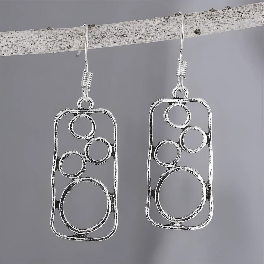 Geometric irregular square zinc alloy earrings with antique silver finish.