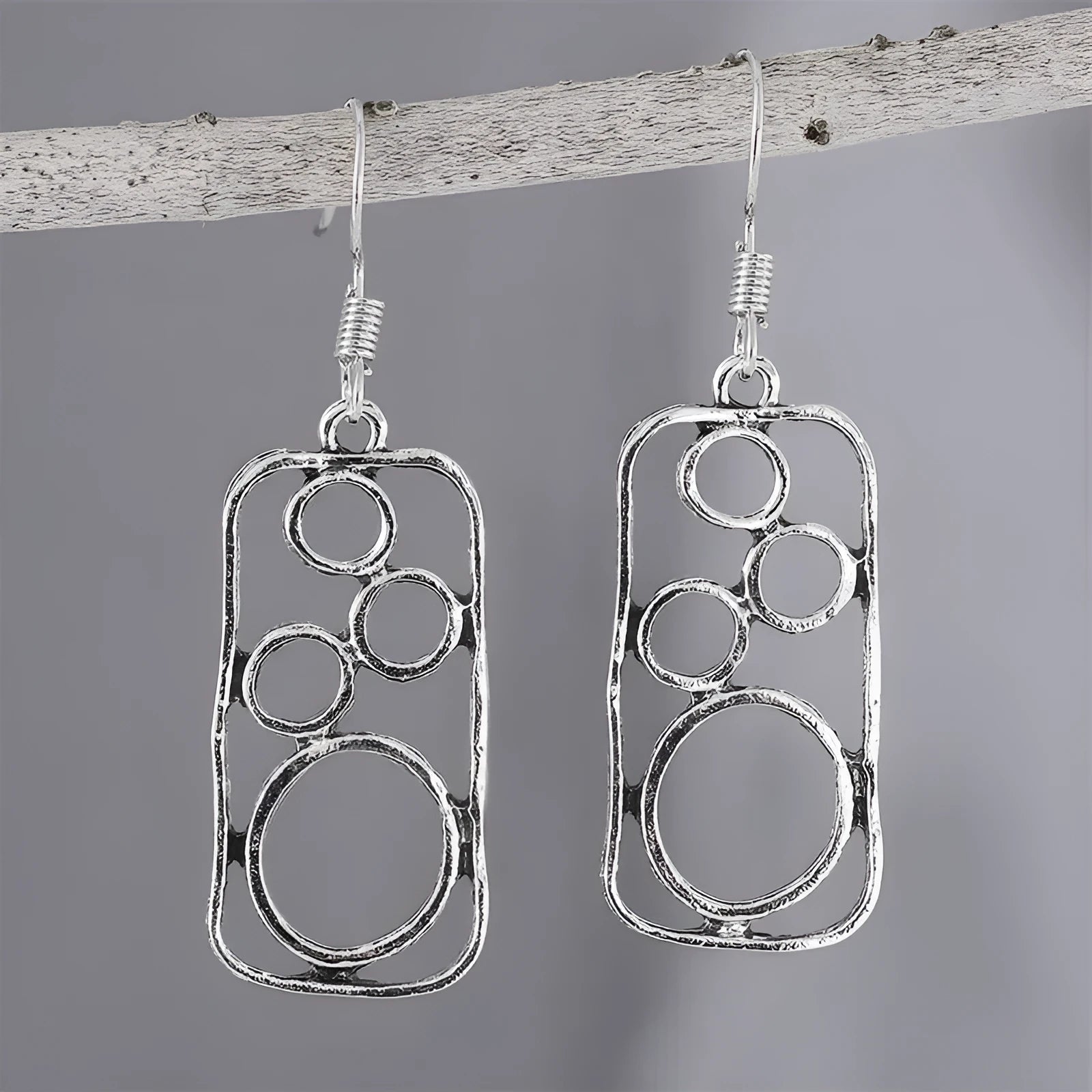 Geometric irregular square zinc alloy earrings with antique silver finish.