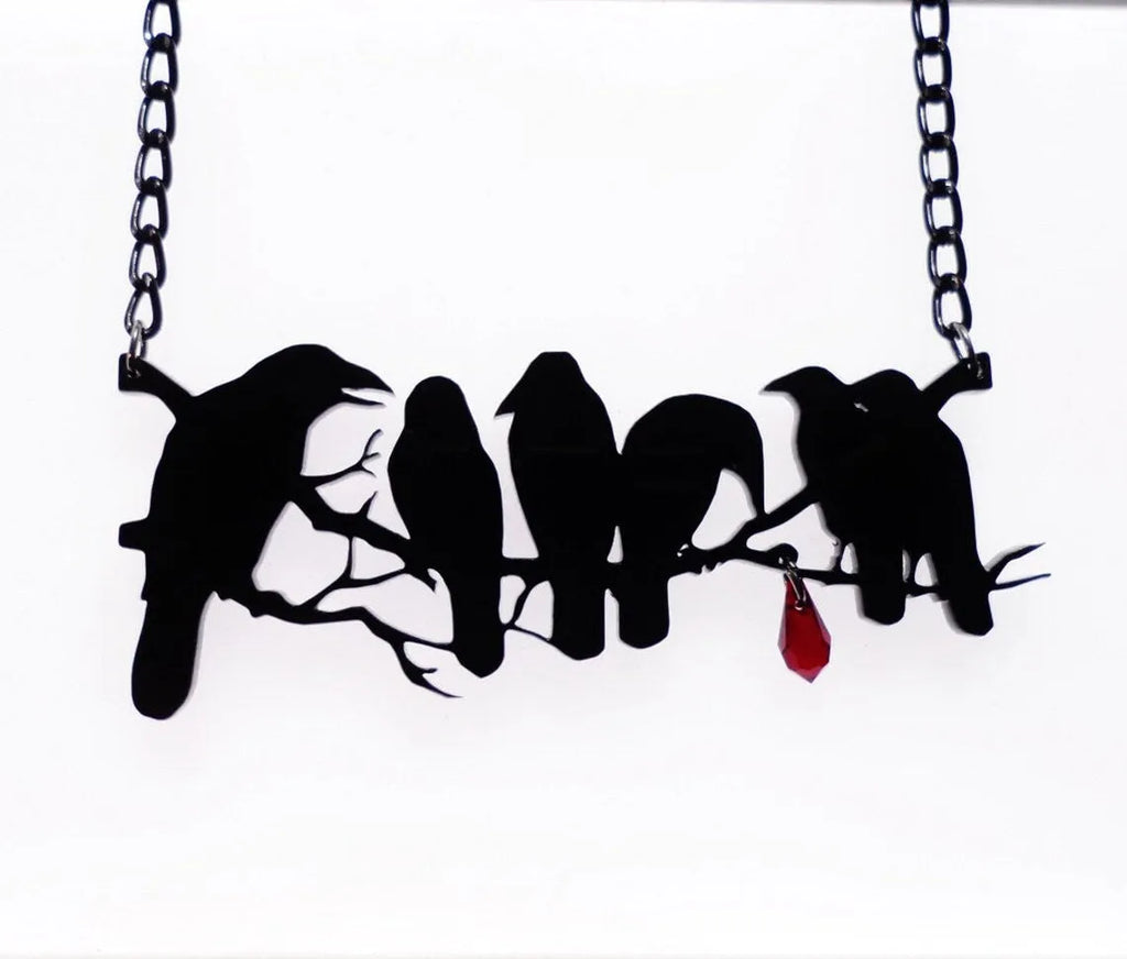 Black gothic style crow bird pendant on a cross chain necklace