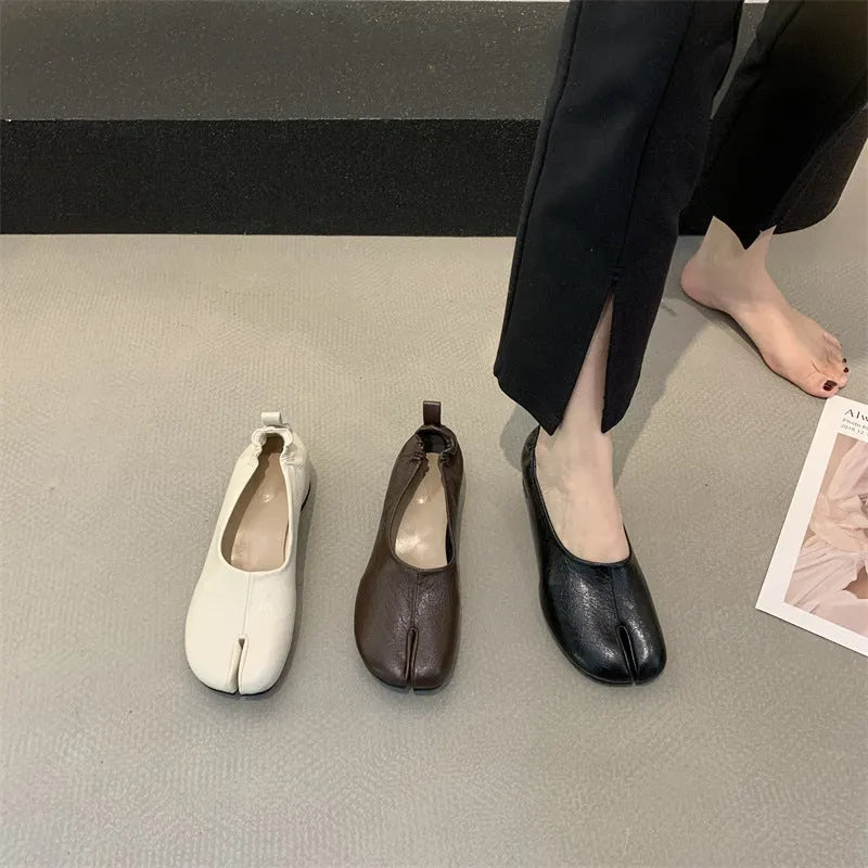 Women's apricot split toe chunky heel pumps with round toe and low heel on a white background.