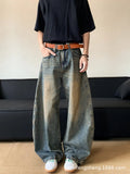 Men's retro blue distressed denim jeans with wide-leg silhouette and micro elasticity fabric