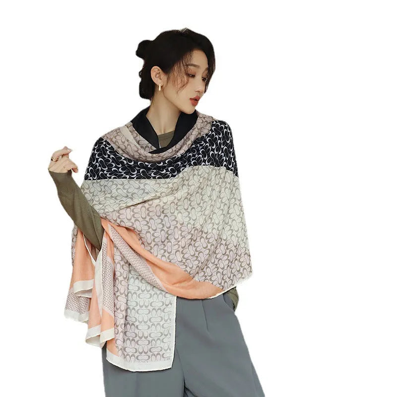 Women's vintage printed polyester scarf draped to show its 180cm length and 90cm width.