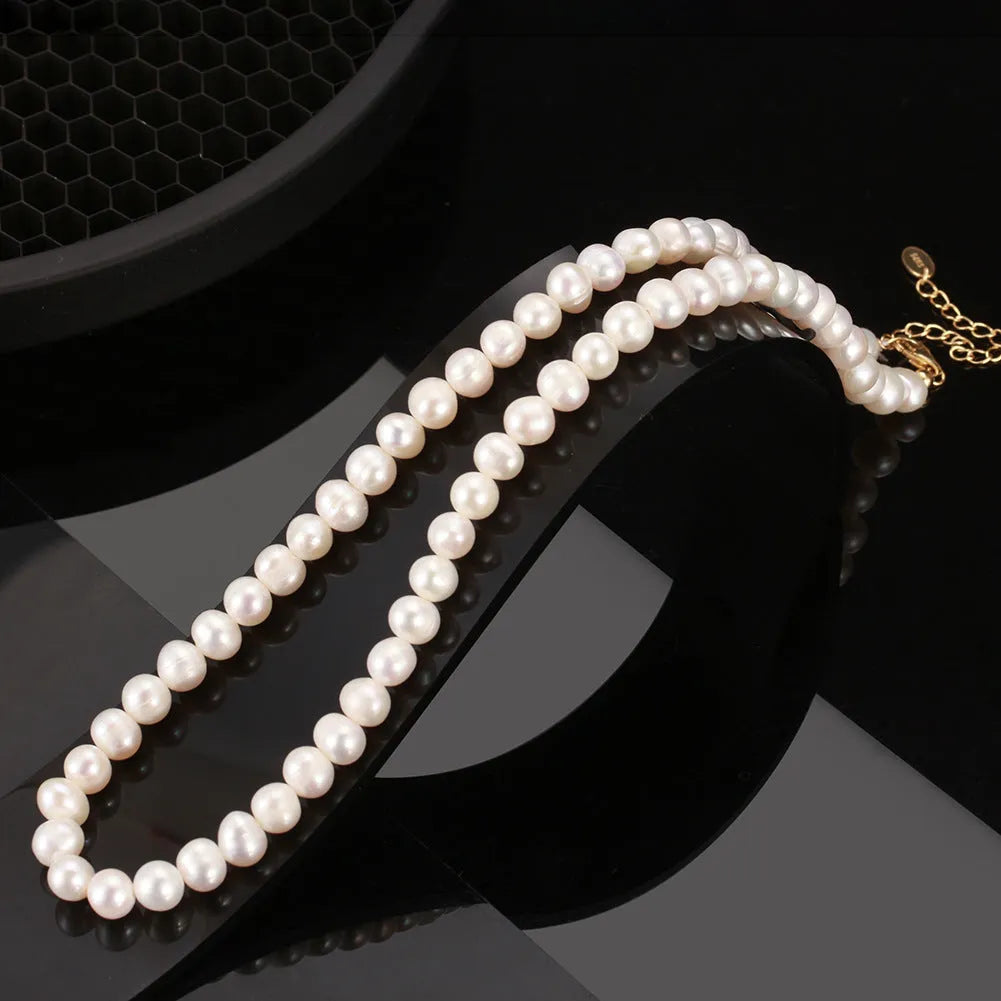 Women's adjustable freshwater pearl necklace in sterling silver with 6-7mm natural pearls