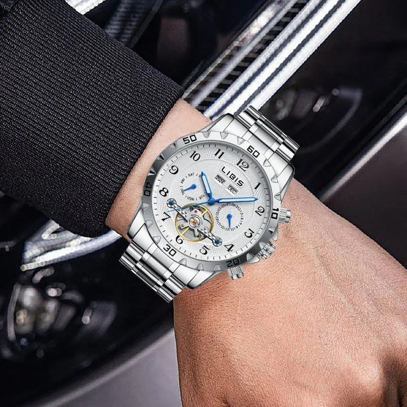 Men's silver automatic perpetual calendar mechanical watch with stainless steel strap.