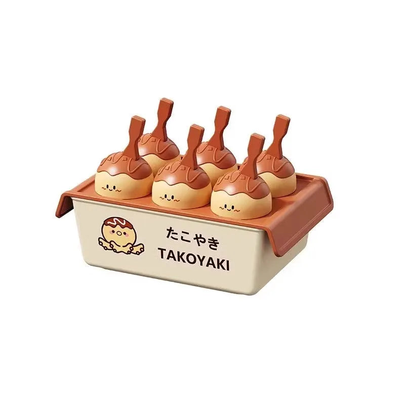 Octopus balls ice cream mould made from white plastic with multiple spherical cavities for homemade frozen desserts