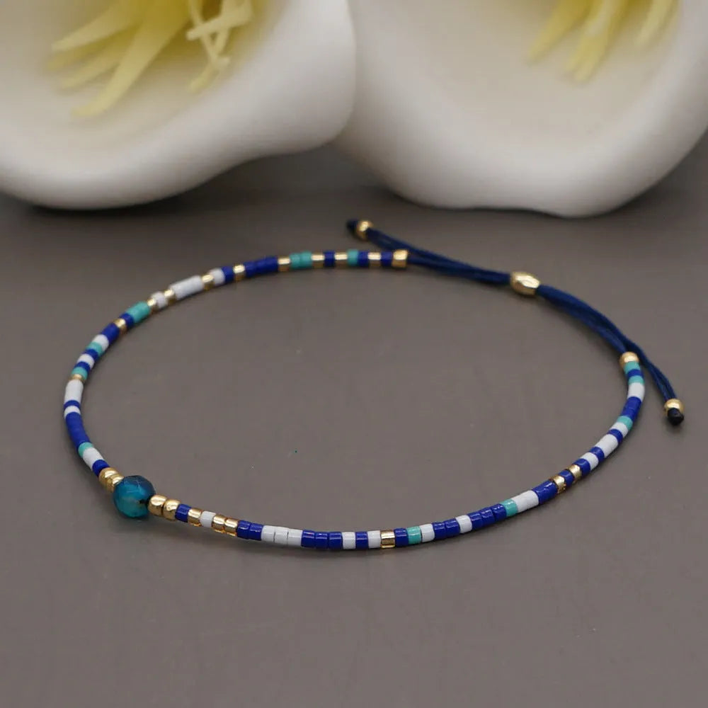 Handmade bohemian-style bracelet with colourful geometric glass beads for women.
