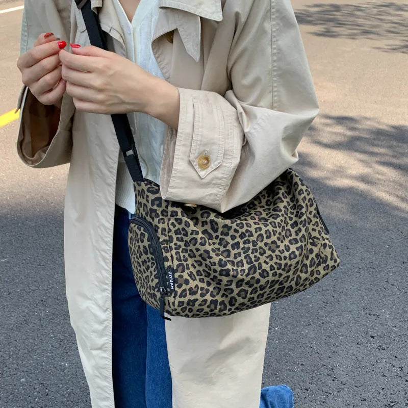 Leopard print sports style messenger shoulder bag with large capacity and cross-body strap