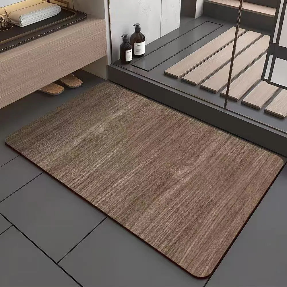 Square American-style diatom ooze floor mat with a geometric wood grain pattern in a bathroom setting.
