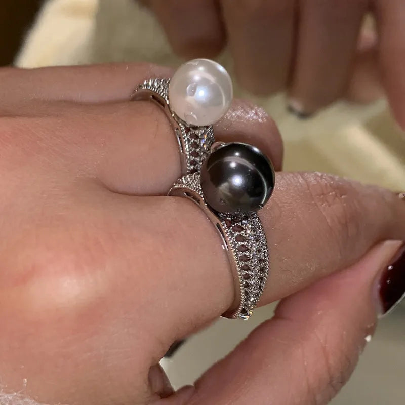 Adjustable black pearl copper ring with geometric open design for women