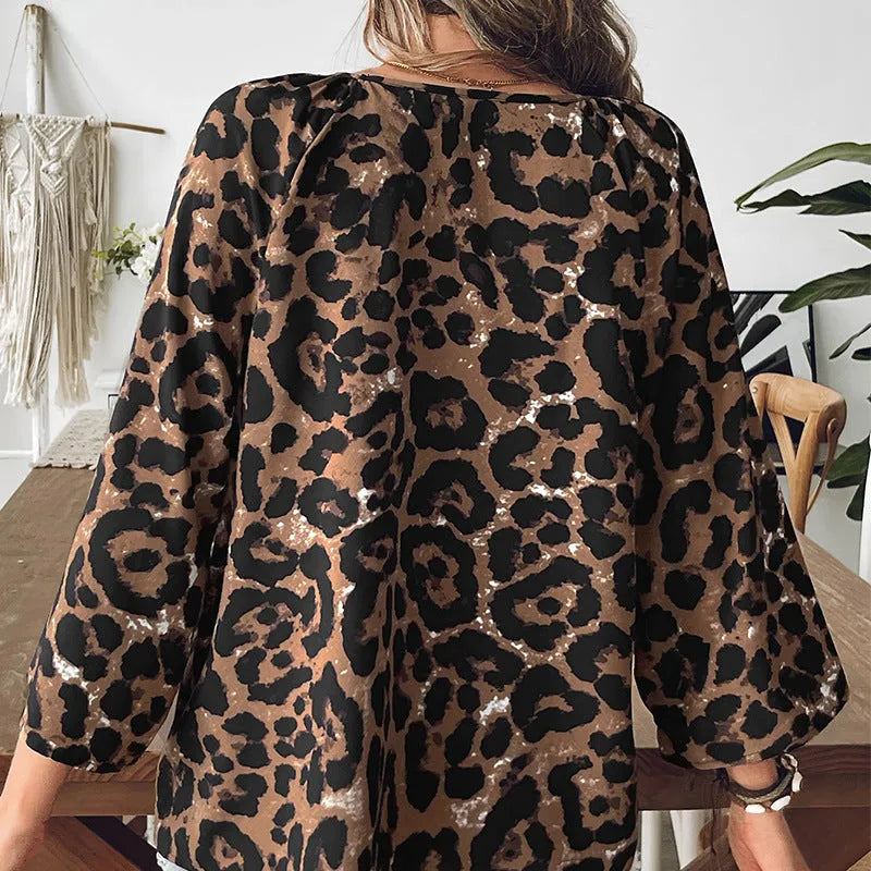 Leopard print women's polyester pullover top with V-neck and half sleeves in multicolour pattern