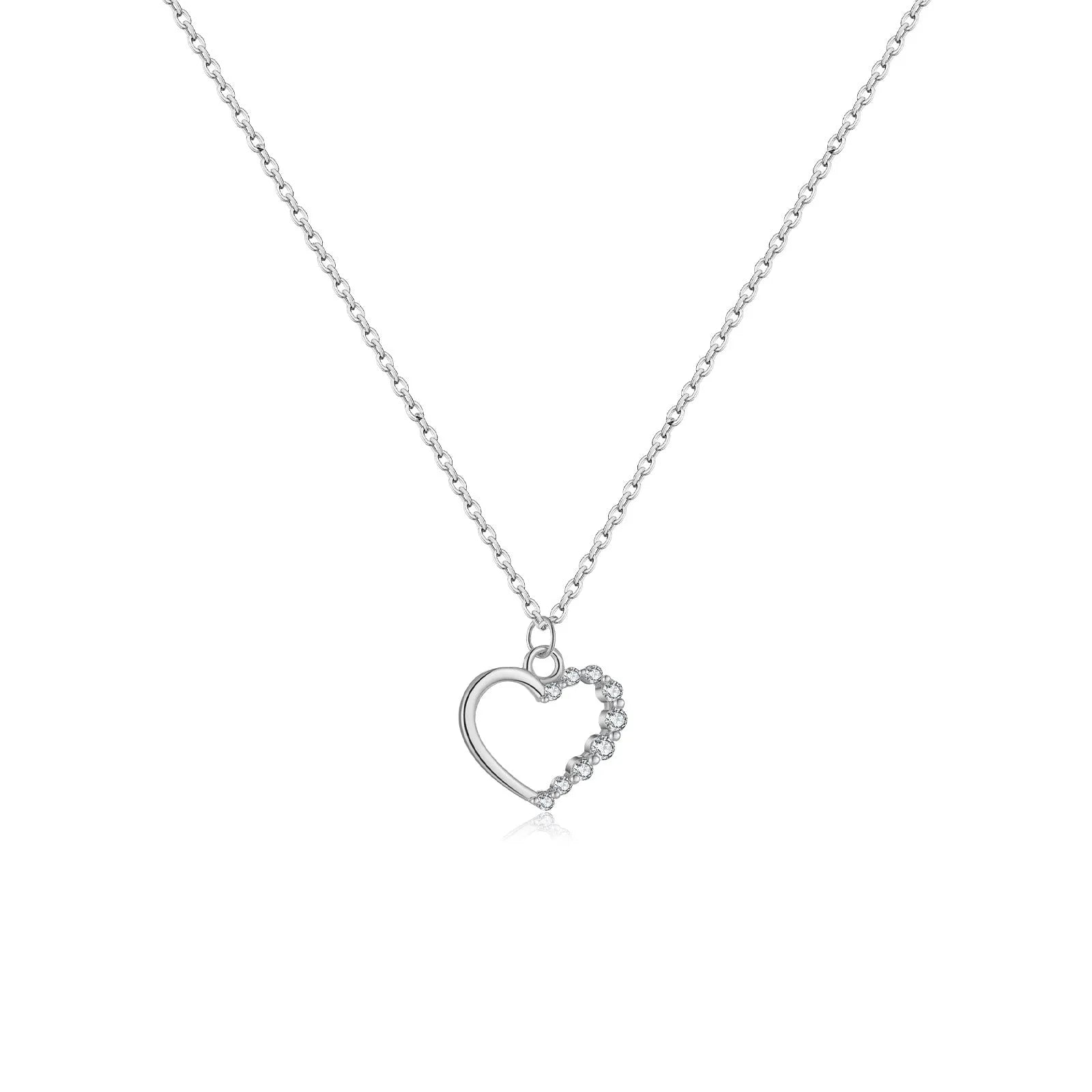 Sterling silver hollow heart and circle pendant necklace on a regular chain, shown in a gold tone finish.