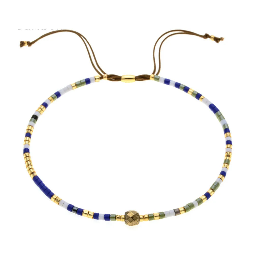 Handmade bohemian-style bracelet with colourful geometric glass beads for women.