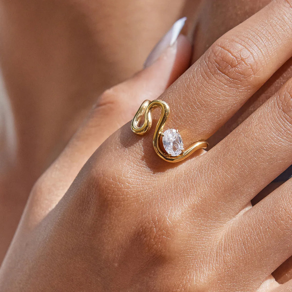 Geometric zircon ring with no-fade titanium steel finish in silver tone.
