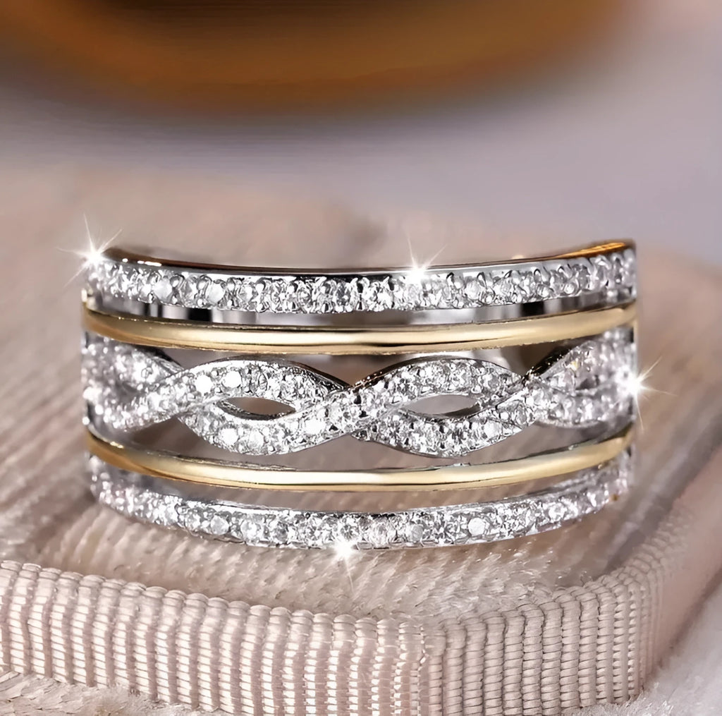Platinum alloy wide face ring with hollow jeweled detailing, diamond treatment finish, women's ring