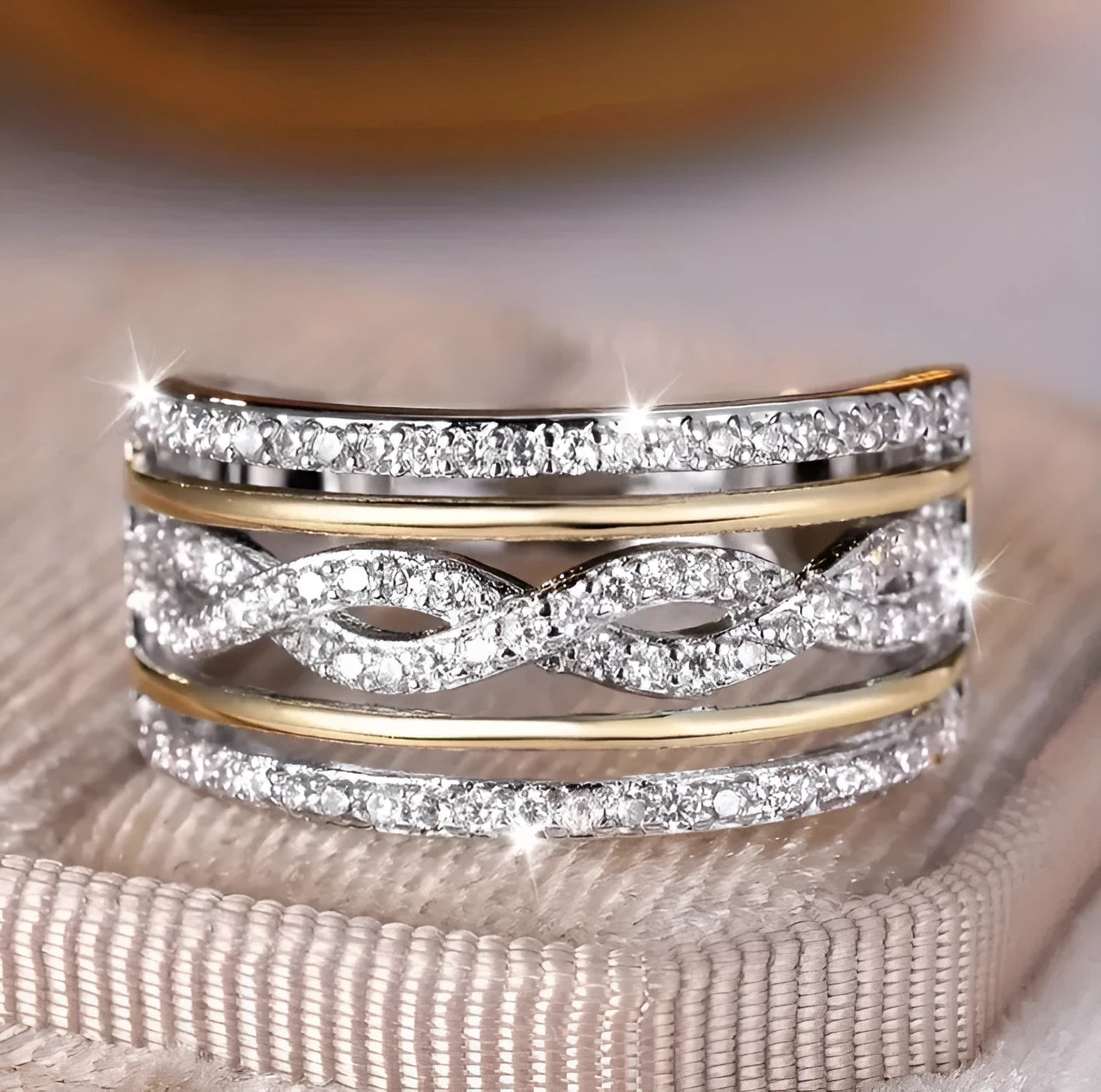 Platinum alloy wide face ring with hollow jeweled detailing, diamond treatment finish, women's ring