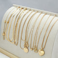 10-piece gold electroplated women's necklace set with alloy pendants on adjustable snake bone chain