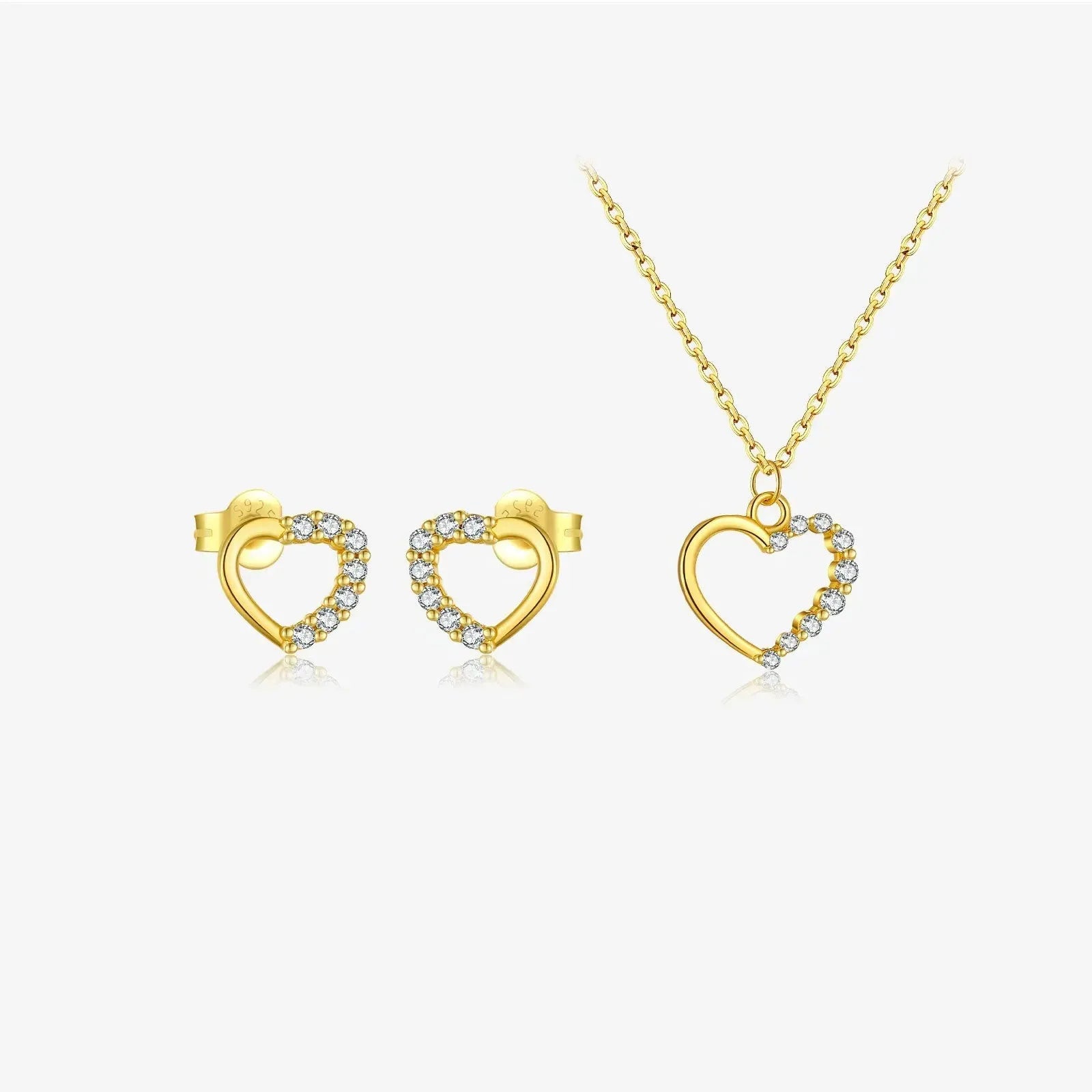 Sterling silver hollow heart and circle pendant necklace on a regular chain, shown in a gold tone finish.