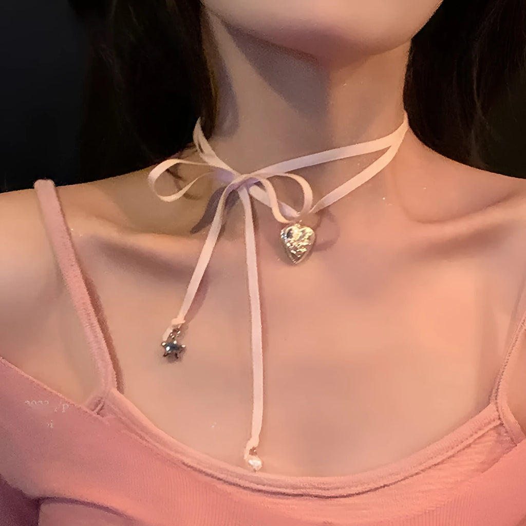 Women's love pendant necklace with ribbon detailing on alloy clavicle chain