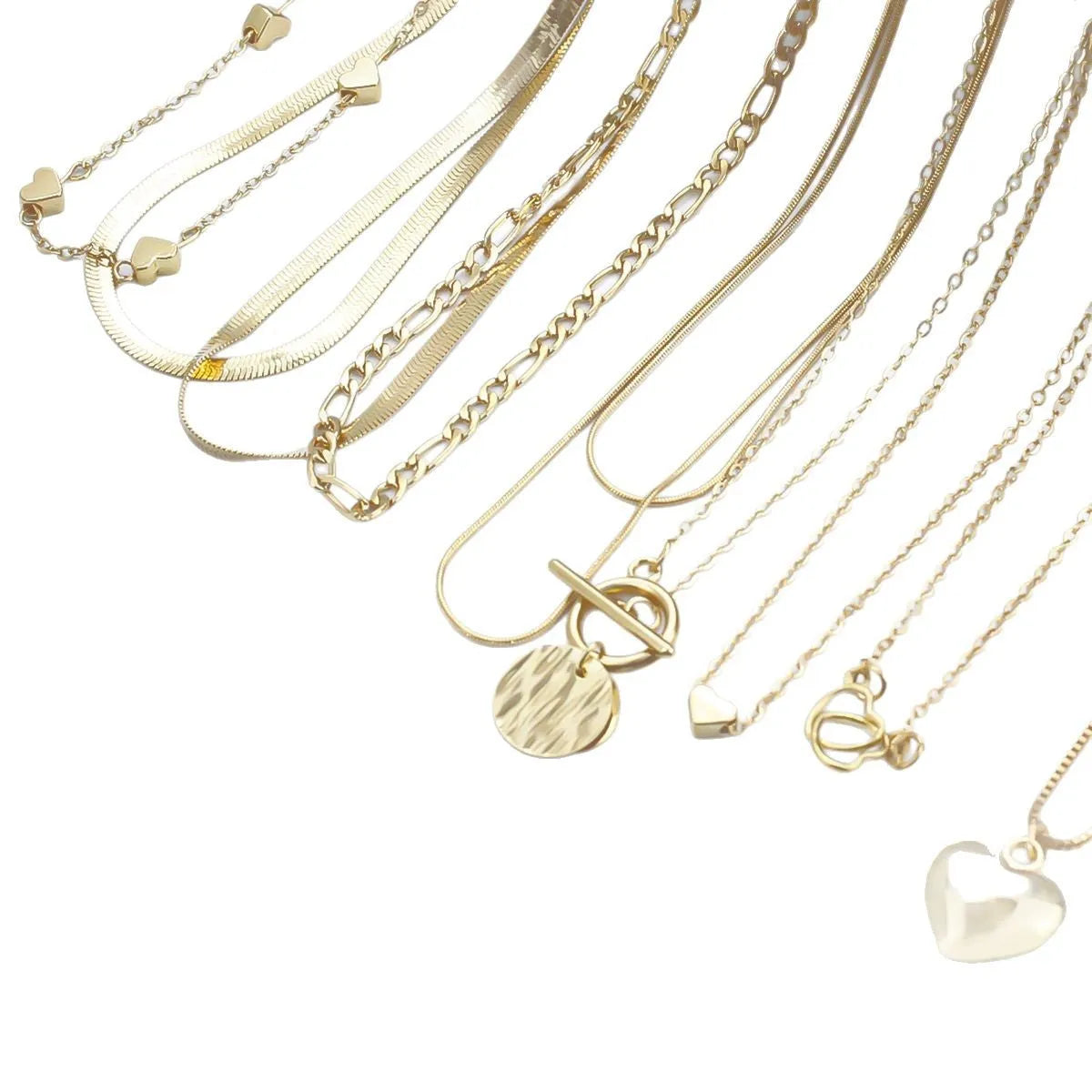 10-piece gold electroplated women's necklace set with alloy pendants on adjustable snake bone chain