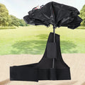 Black portable umbrella holder with a shoulder strap for beach sunshades, shown next to a manual umbrella