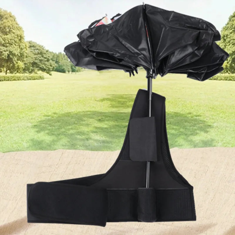 Black portable umbrella holder with a shoulder strap for beach sunshades, shown next to a manual umbrella
